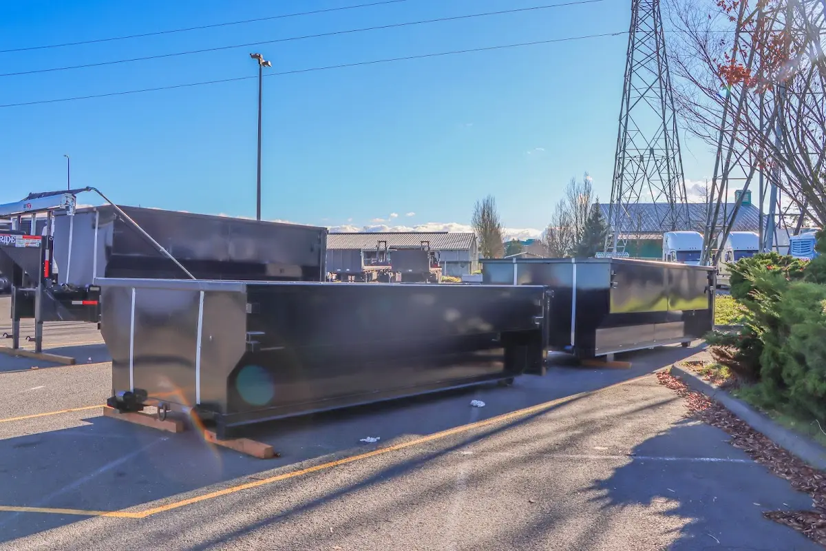 Roll-off dumpster ready for waste disposal at job site for 3 Yard Dumpster Rental in Fuquay
